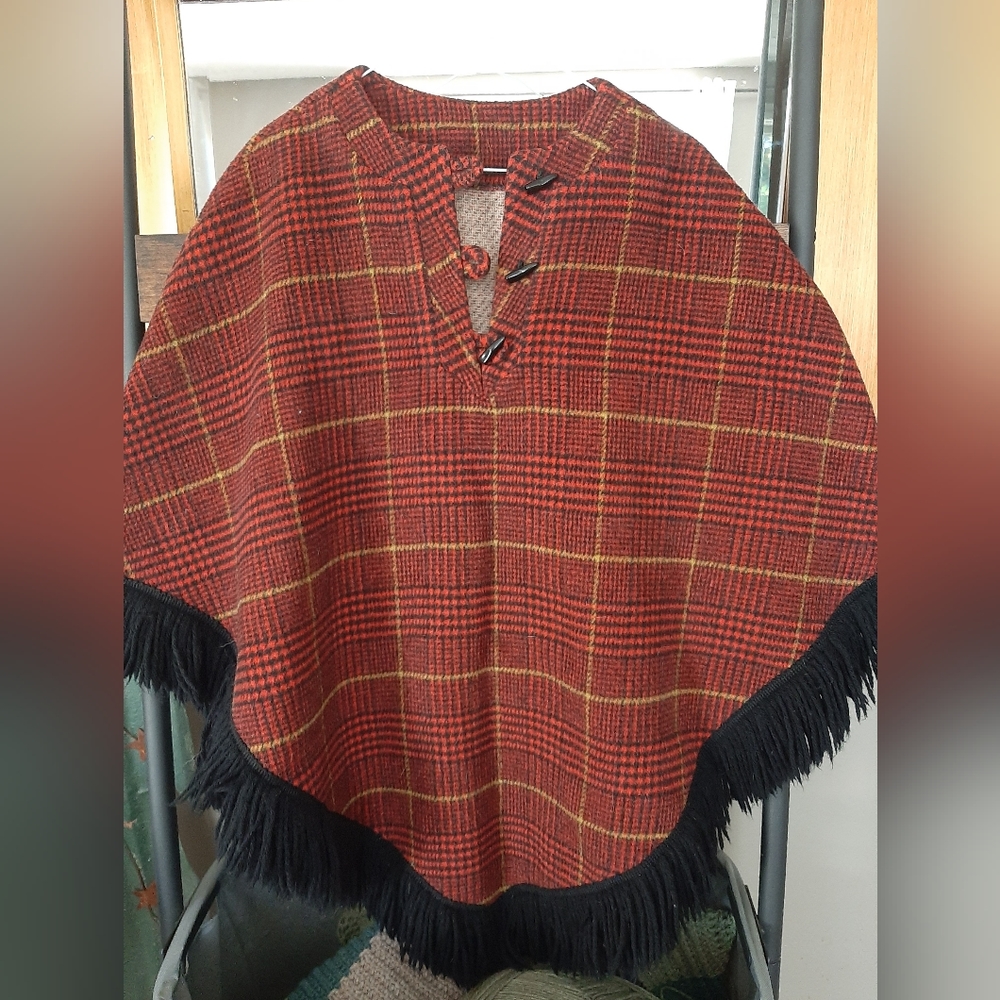 Wool blend red plaid poncho with black trim